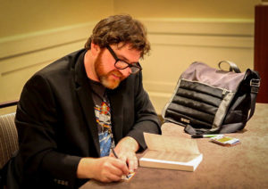 Ernie Cline at a book signing