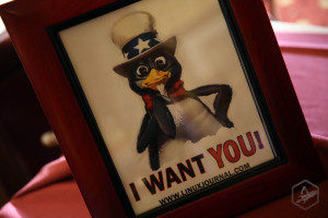 Picture of penguin with hat with text below stating, "I WANT YOU!"