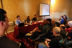 Room with a speaker panel and audience